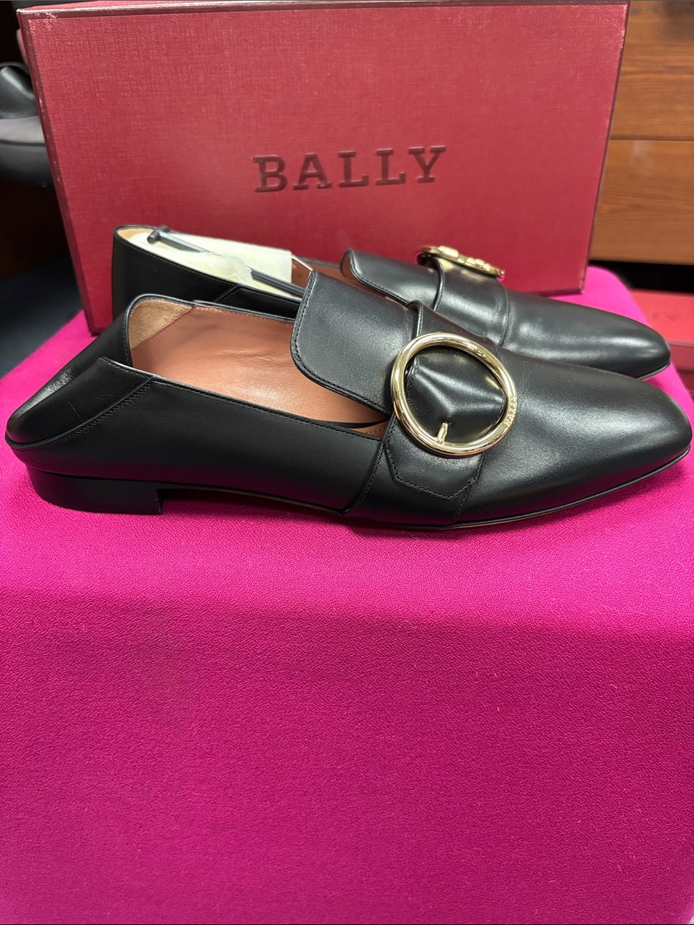 Bally Black Leather Loafers with Gold Ring Accent